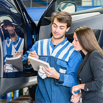 Car mechanic in Brisbane showing certificates